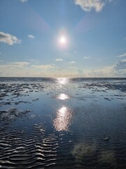 Sunset over the sea at ebb