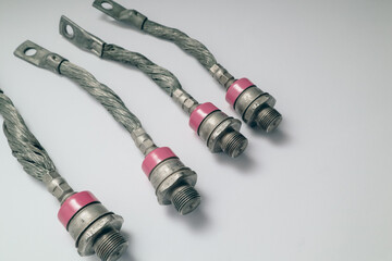 Electronic component: heavy power rectifier diode with screw for mounting on heatsink on white...
