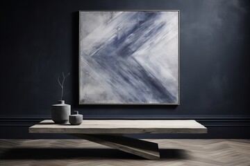 Fototapeta premium A minimally designed modern interior showcasing a large abstract painting in shades of grey and white, set above a sleek wooden bench. The simple yet stylish scene is complemented by a dark blue wall