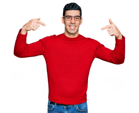 Handsome hispanic man wearing casual clothes and glasses looking confident with smile on face, pointing oneself with fingers proud and happy.