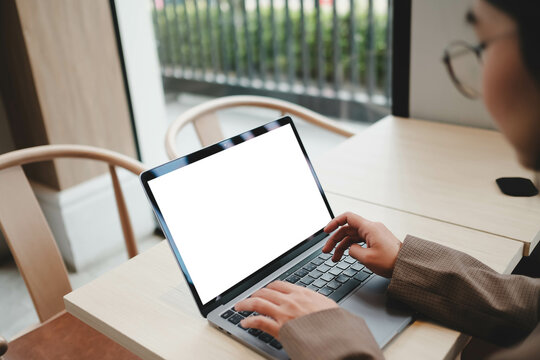 A blank screen for hand typing text,using laptop contact business searching information in workplace on desk at office.