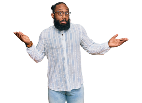 Young african american man wearing business shirt and glasses clueless and confused expression with arms and hands raised. doubt concept.