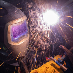 electric welder during operation