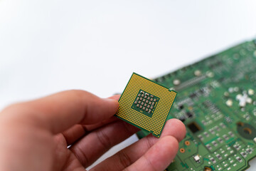 IC CPU in hand with PCB board background. Concept of Technology computer and hardware computer.