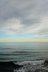 Beautiful evening sky over the sea on the shore of the city of Torrevieja in Spain