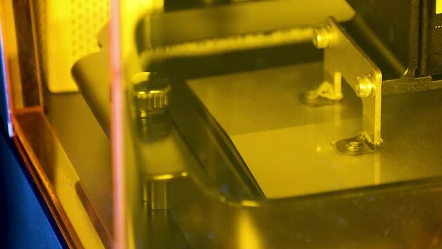 Detail of a 3d resin printer in operation