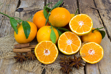 fresh tangerines on wooden background