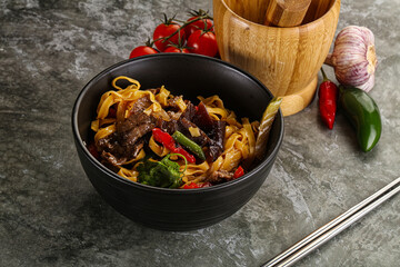 Asian wok with noodle, vegetables and beef