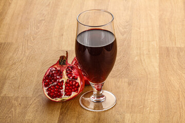 Sweet pomegranate juice in glass