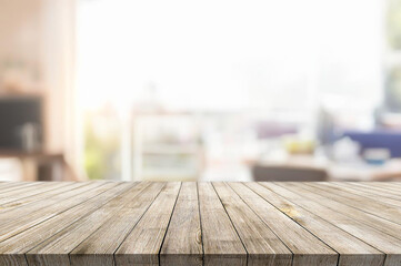 Wooden table or surface with blurred interior background