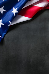 American flag on dark concrete background. USA national holidays concept. Independence Day,...