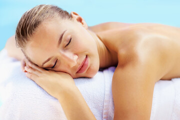 Woman, sleeping and health on bed in spa to relax, wellness and recovery with rest, peace and...