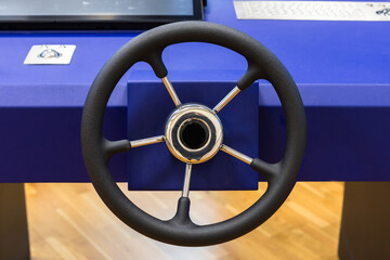 Marine navigation simulation system, ship control panel with steering wheel