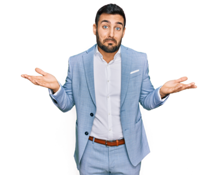 Young hispanic man wearing business jacket clueless and confused expression with arms and hands raised. doubt concept.