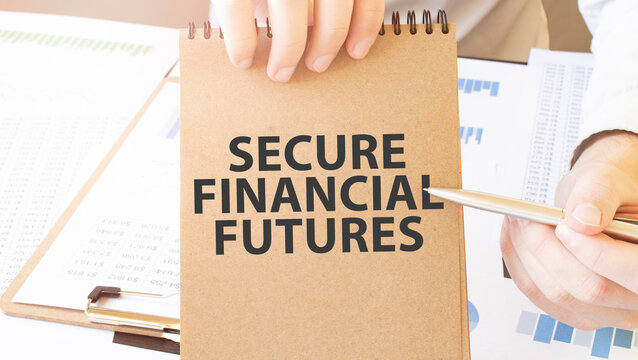 Text SECURE FINANCIAL FUTURES on brown paper notepad in businessman hands on the table with diagram. Business concept