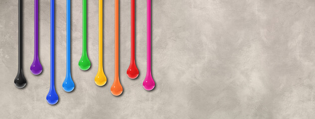 Colorful ink drops on light concrete wall. Horizontal banner