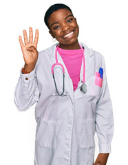 Young african american woman wearing doctor uniform and stethoscope showing and pointing up with...