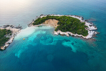 Aerial View of an Island in the Albanian Riviera with a Pedal Boat - obrazy, fototapety, plakaty