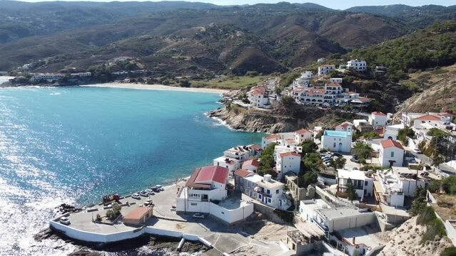 Mediterranean aerial view of small village on the Aegean Sea coast in Ikaria