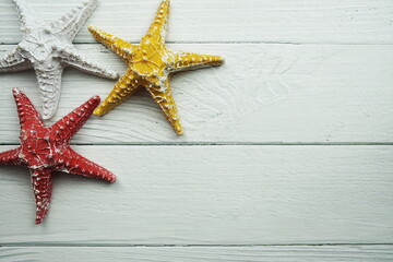 Nautical decorative Starfish flat lay on wooden background
