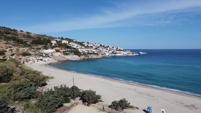 Mediterranean aerial view of small village on the Aegean Sea coast in Ikaria