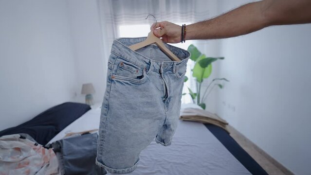 Jeans shorts are shown in a room