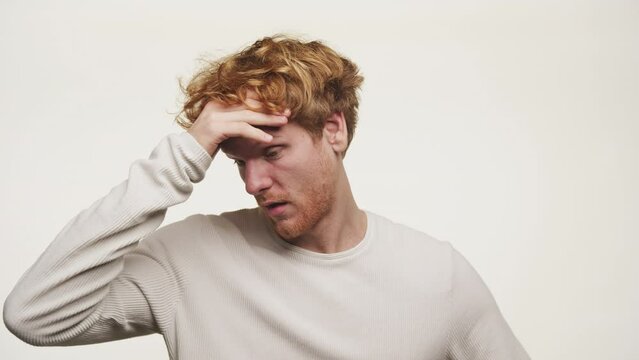 Man in Trouble Upset Ginger Guy on White Background