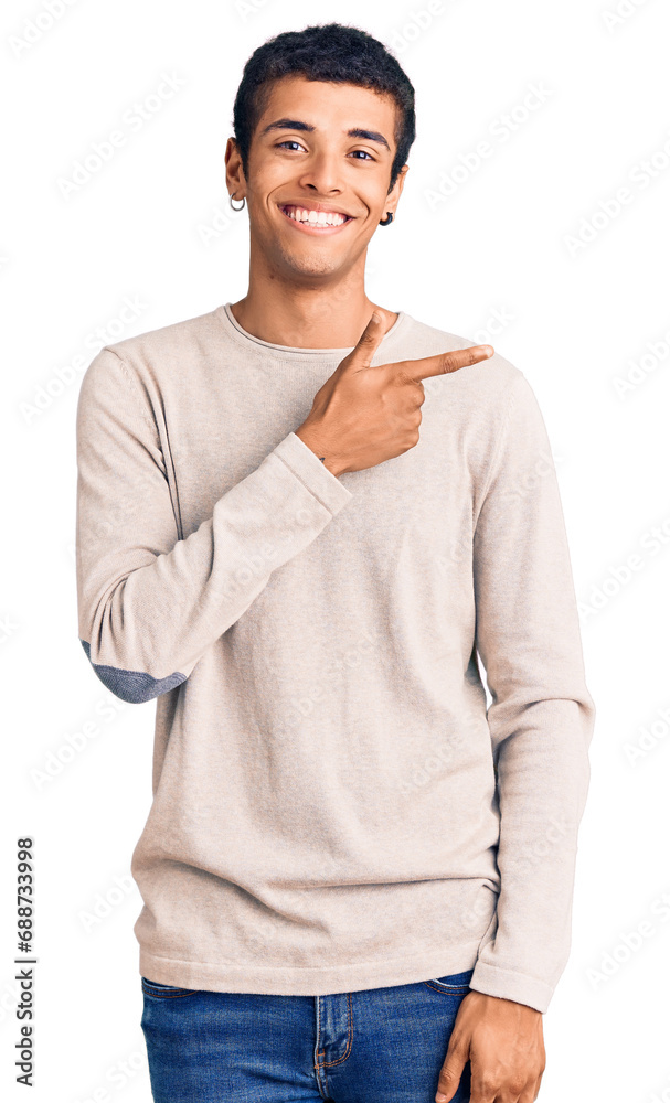 Canvas Prints Young african amercian man wearing casual clothes cheerful with a smile of face pointing with hand and finger up to the side with happy and natural expression on face