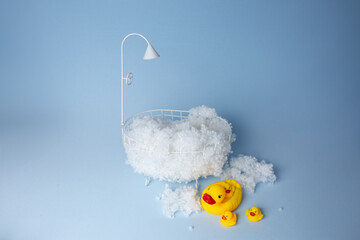 children's holiday decoration of the photo zone. small baby bath with foam and rubber duckies....