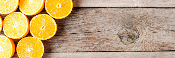 Fresh oranges on wooden table. Top view