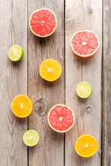 Fresh citruses on wooden table. Top view