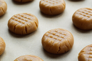 Peanut butter cookie dough on baking sheet