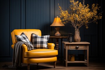 The interior design of the living room with a blue armchair and a yellow plaid along with rattan furniture in a room adorned with paneling walls of a farmhouse or boho style home interior