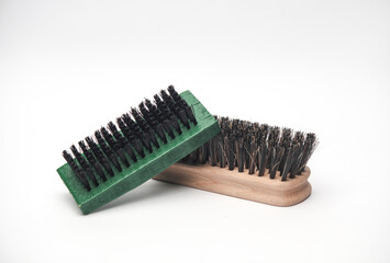 Shoe brushes on white background. Footwear care