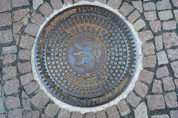 Manhole cover in Prague, Czech Republic