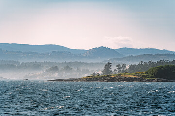 Fog off the coast of Vancouver Island in the Puget Sound. Looking towards Victoria BC.