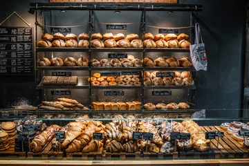 Fotobehang Fresh baked bread in a bakery in Prague, Czech Republic © Zachary
