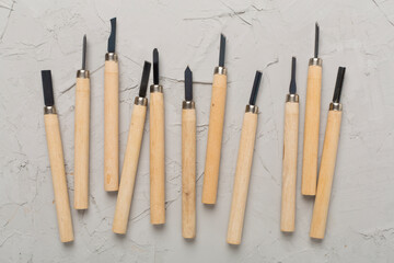 Carpenter tools on concrete background,top view