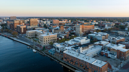 Aerial view of historic downtown Wilmington, NC. Riverwalk next to the Cape Fear River.