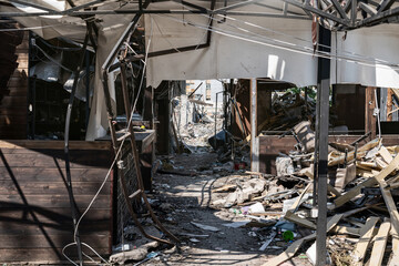 Cafe ruins in the city of Kramatorsk. Consequences of a Russian missile attack. View from the inside