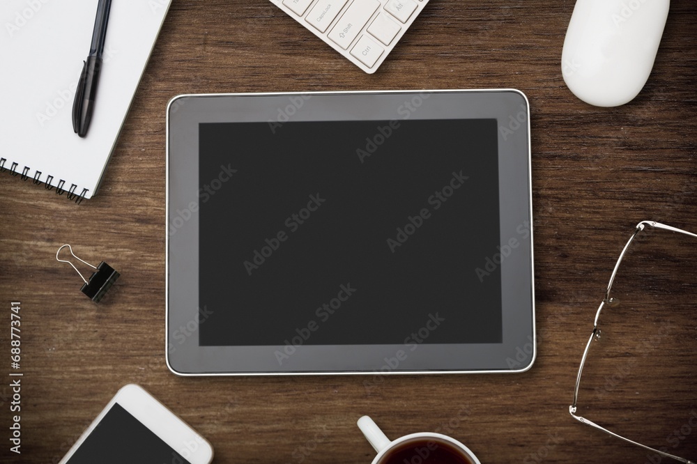 Poster Tablet computer for business reports on office desk