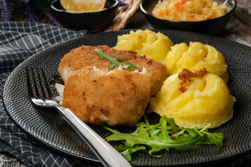 Fried cod fillet served.