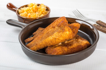 Pieces of cod in breadcrumbs.