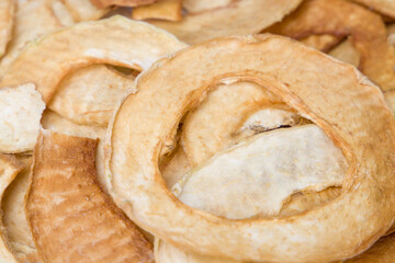 Dried melon slices background. Close up view.