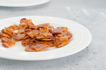 Fried bacon close-up on a plate