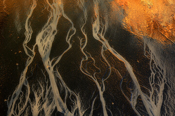 Abstract aerial view of river delta patterns