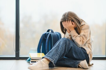 A Unhappy depress Pre teen girl at school