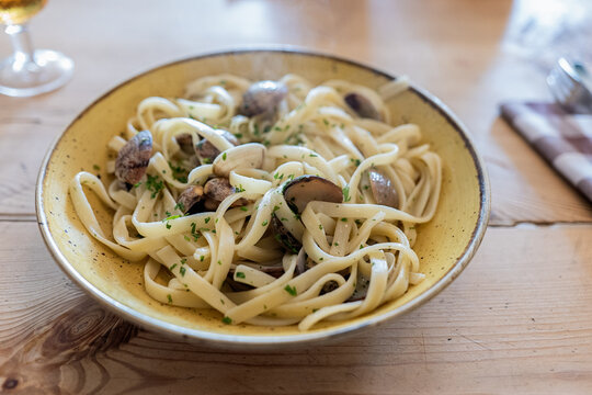 Fettuccine pasta with clams served in plate