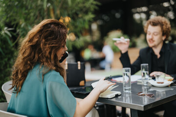 Young partners discussing strategic planning, market research, and growth strategies in an urban city coffee bar. They analyze finances and target audiences for small business success.