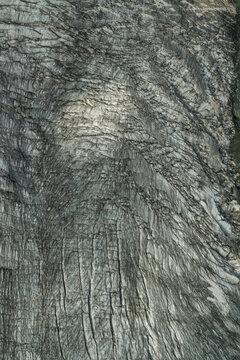 Closeup of Snow covered rough landscape with textured pattern in winter